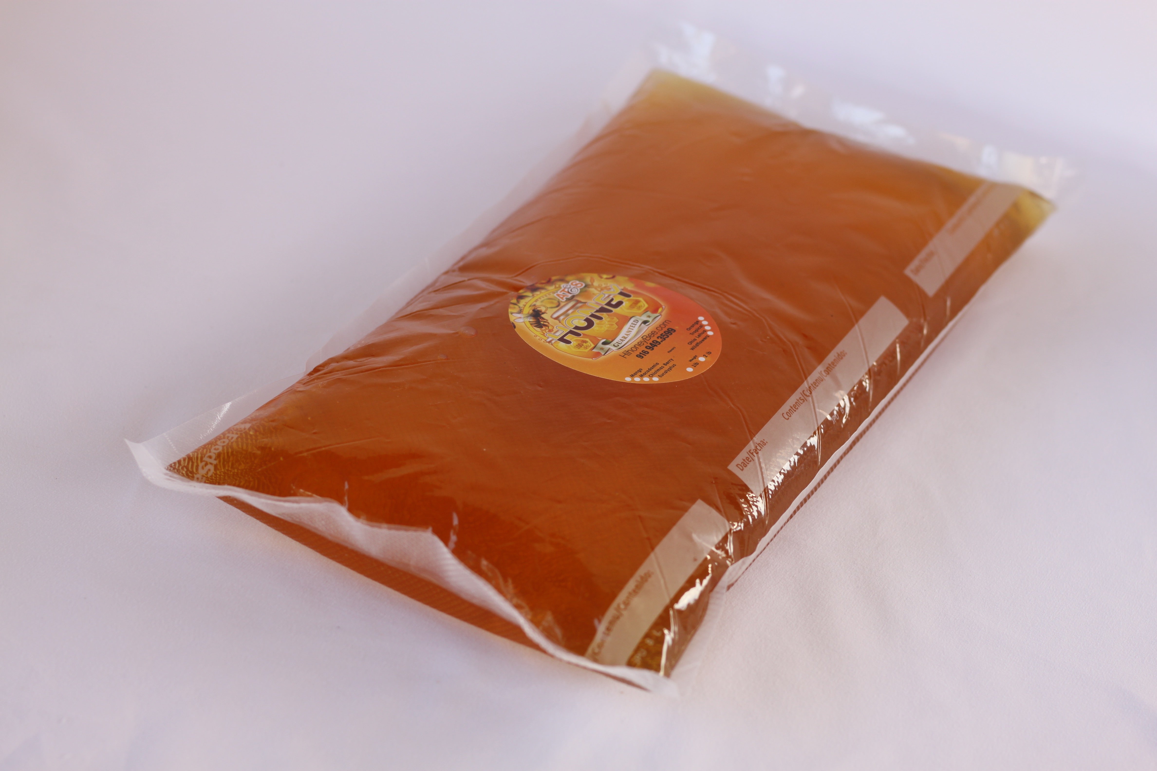 Gallon of Pure Hawaiian Honey-12 lb · Mango